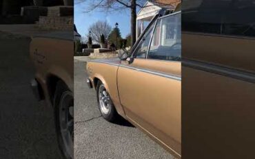 Amc-Rambler-1966-Gold-White
