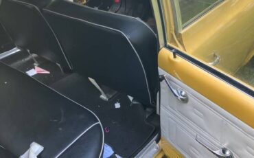 Amc-rambler-classic-1962-yellow-11