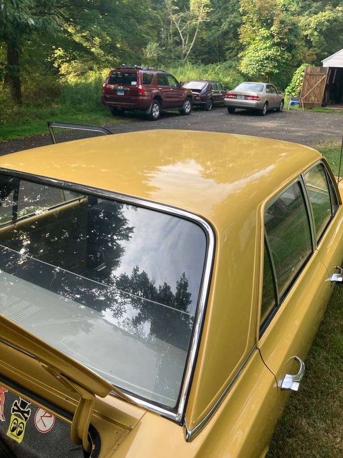 Amc-rambler-classic-1962-yellow-3