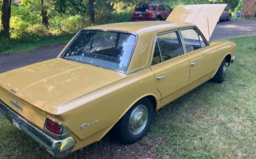 Amc-rambler-classic-1962-yellow-5