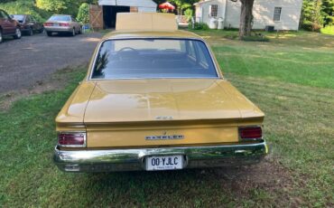 Amc-rambler-classic-1962-yellow-6