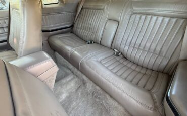 And-1993-buick-rivieras-1991-white-4