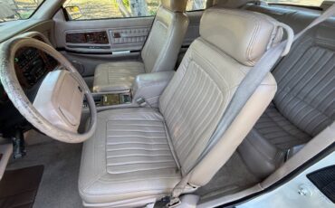 And-1993-buick-rivieras-1991-white-5