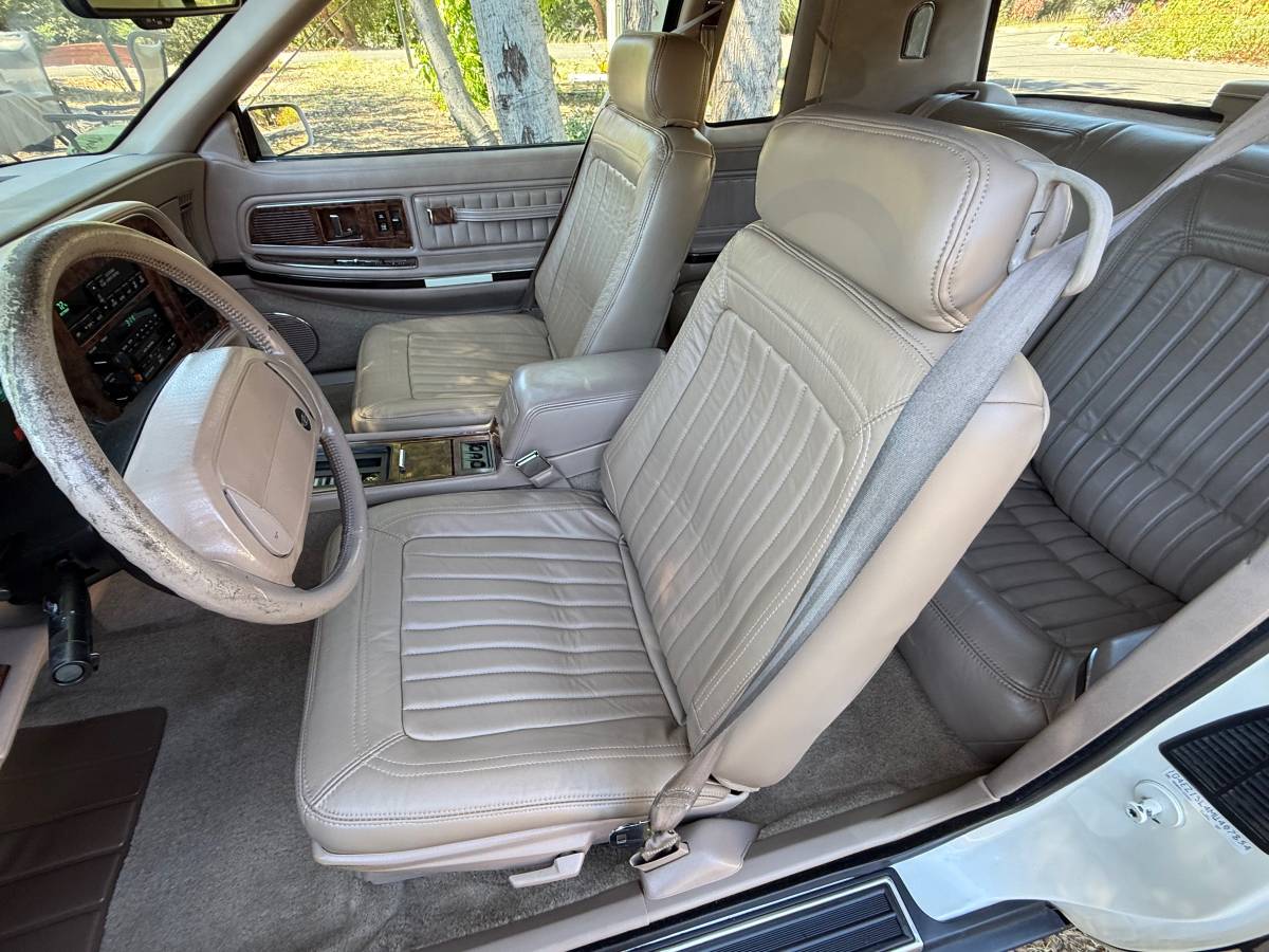 And-1993-buick-rivieras-1991-white-5