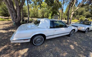 And-1993-buick-rivieras-1991-white-9