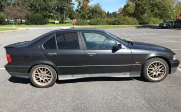 Bmw-320i-1993-black-1