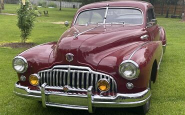 Buick-Sedanette-1946-Ruby-red-maroon-Red-and-silver-1