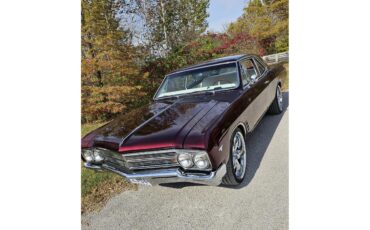 Buick-Skylark-1966-Candy-Cranberry-red-White-and-leather
