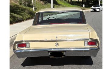 Buick-Special-1963-Tan-Red-@-white-1
