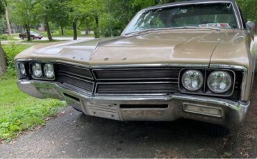 Buick-Wildcat-1967-Gold-Black-Leather-5