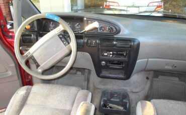 Burgandy-ford-aerostar-xlt-1994-purple-1