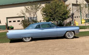 Caddi-deville-convertible-1964-blue