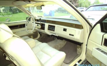 Cadillac-1991-yellow-3