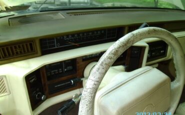 Cadillac-1991-yellow-8