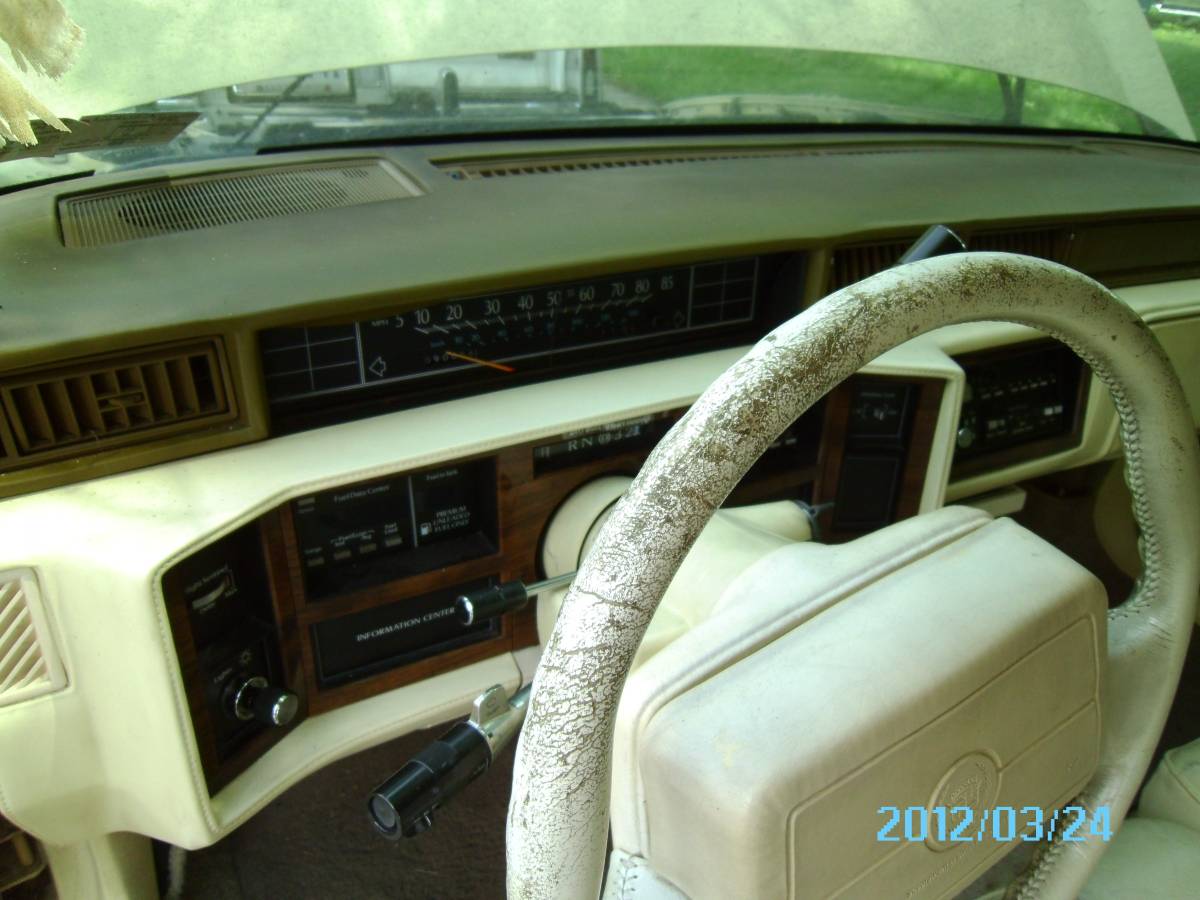 Cadillac-1991-yellow-8