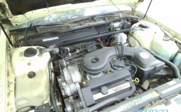Cadillac-1991-yellow-9