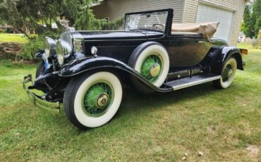 Cadillac-353-1930-Black-Green-Leather-7