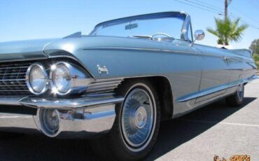 Cadillac-Biarritz-1961-teal-off-white-14