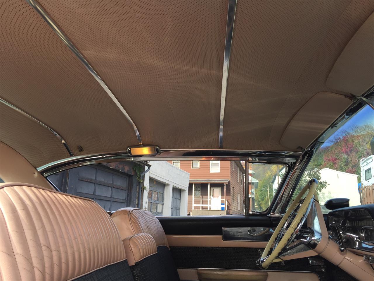 Cadillac-Coupe-deville-1957-Laurel-Mountain-Pink-PinkSilver-16