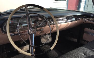 Cadillac-Coupe-deville-1957-Laurel-Mountain-Pink-PinkSilver-18
