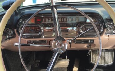 Cadillac-Coupe-deville-1957-Laurel-Mountain-Pink-PinkSilver-19