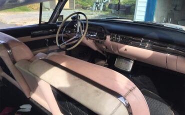 Cadillac-Coupe-deville-1957-Laurel-Mountain-Pink-PinkSilver-5