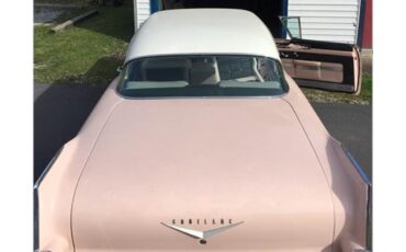 Cadillac-Coupe-deville-1957-Laurel-Mountain-Pink-PinkSilver-8