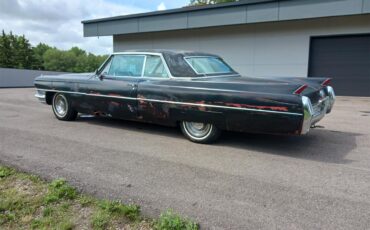 Cadillac-Coupe-deville-1964-black-white-leather-2