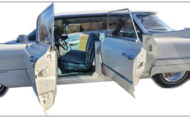 Cadillac-Deville-1959-white-teal-10