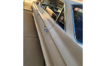 Cadillac-Deville-1961-White-Black-11