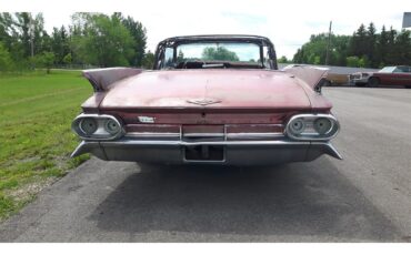 Cadillac-Deville-1961-pompian-red-whiteburgundy-1