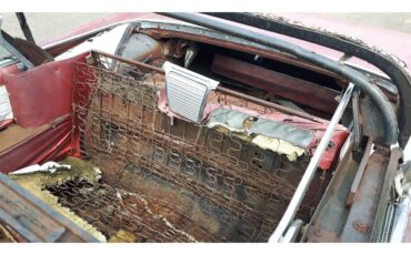 Cadillac-Deville-1961-pompian-red-whiteburgundy-14