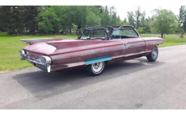 Cadillac-Deville-1961-pompian-red-whiteburgundy