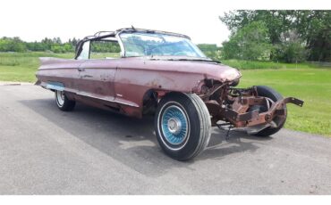 Cadillac-Deville-1961-pompian-red-whiteburgundy-4
