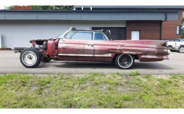 Cadillac-Deville-1961-pompian-red-whiteburgundy-5