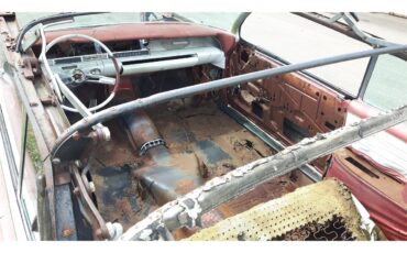 Cadillac-Deville-1961-pompian-red-whiteburgundy-6