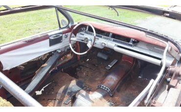 Cadillac-Deville-1961-pompian-red-whiteburgundy-7