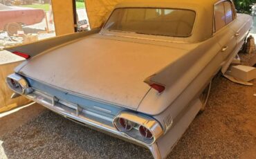 Cadillac-Fleetwood-1961-Blue-12