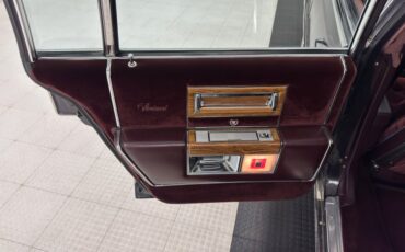 Cadillac-Fleetwood-1985-Dark-Gray-Firemist-M-Dark-Red-1