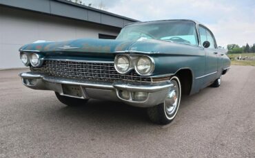 Cadillac-Sedan-deville-1960-tealcream-tealblack