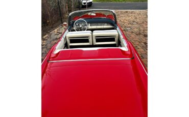 Cadillac-Series-62-1956-red-whitegray-23