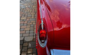 Cadillac-Series-62-1956-red-whitegray-71