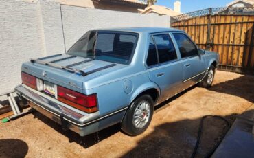 Cadillac-cimarron-1983-blue-23