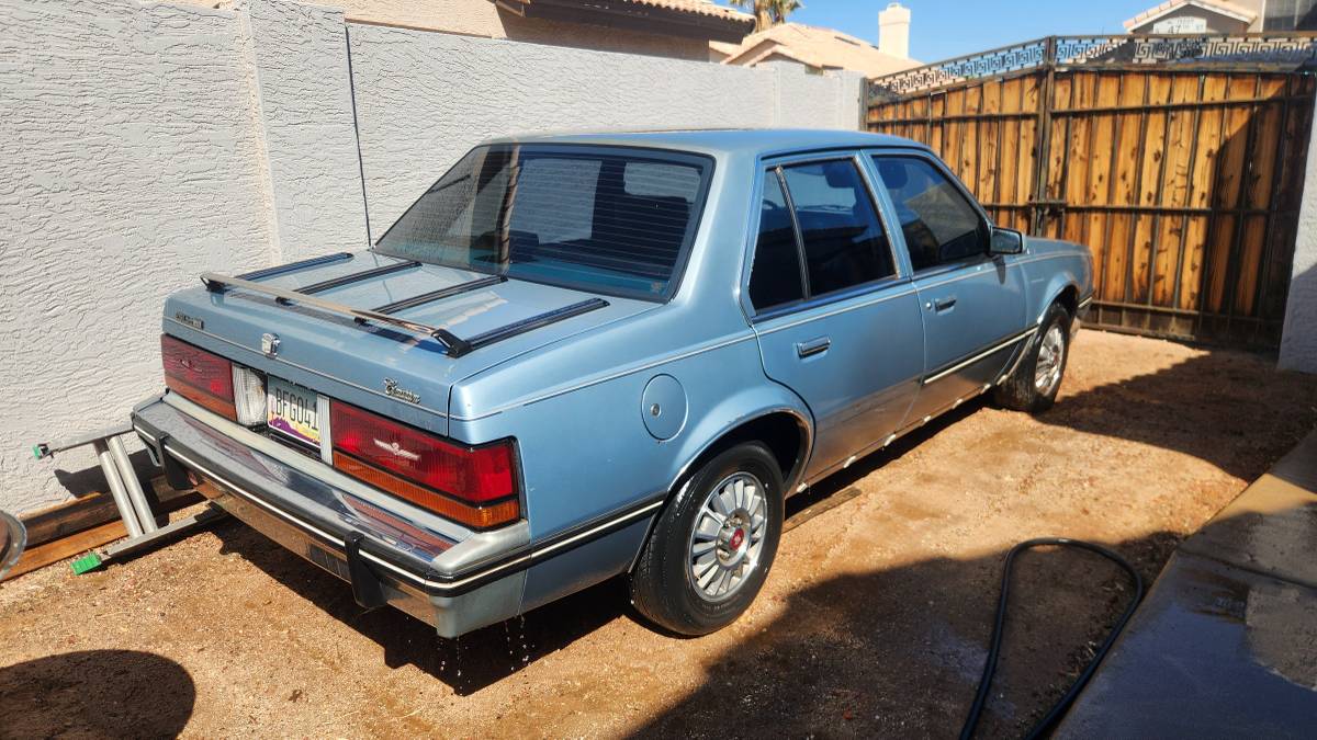 Cadillac-cimarron-1983-blue-23