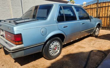 Cadillac-cimarron-1983-blue