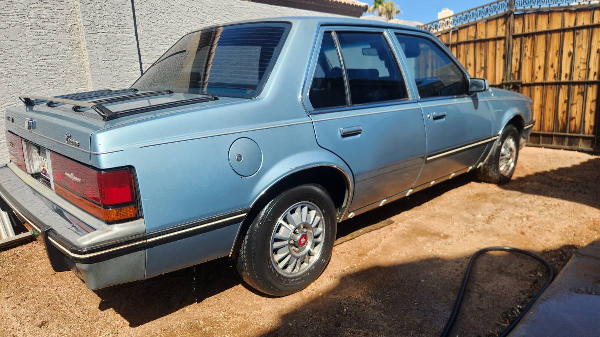 Cadillac-cimarron-1983-blue