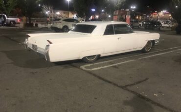 Cadillac-coupe-de-ville-1964-white