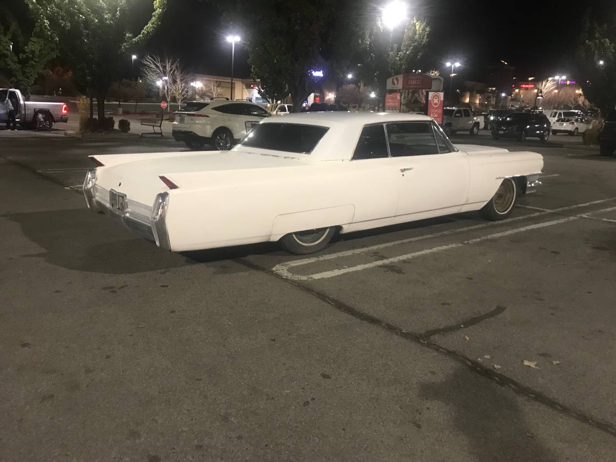 Cadillac-coupe-de-ville-1964-white