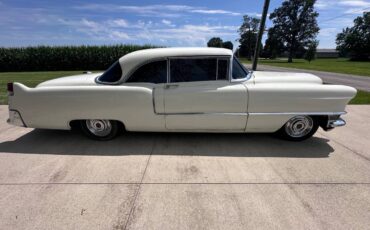 Cadillac-coupe-deville-1955-1