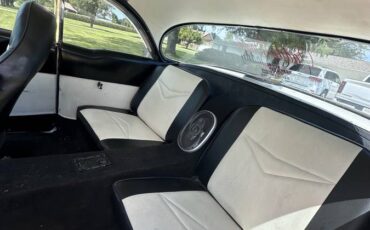 Cadillac-coupe-deville-1955-10